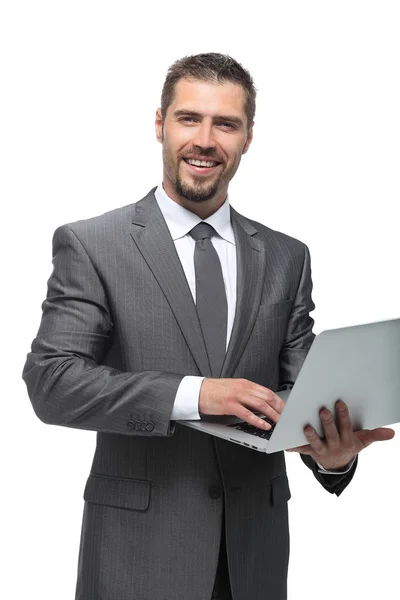 Homem de negócios feliz com um laptop . — Fotografia de Stock