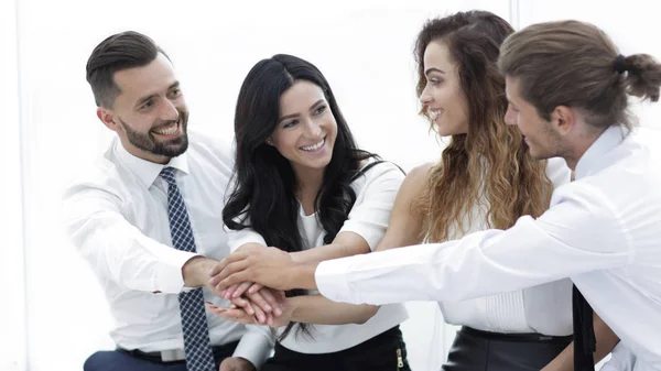 Close-up of business partners making pile of hands — Stock Photo, Image