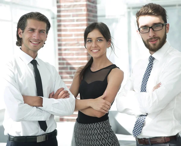 Confident business colleagues in the background of the office — Stock Photo, Image