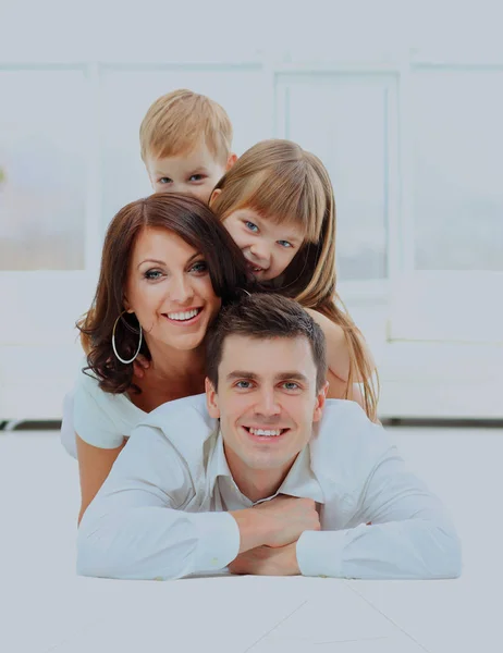 The pyramide of the smiling happy family. — Stock Photo, Image