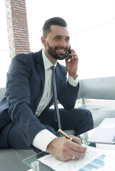 Businessman discussing on a smartphone, business issues — Stock Photo, Image