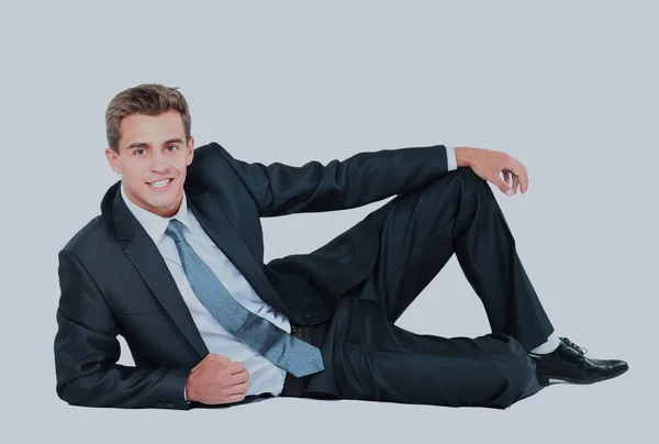 Porträtt av affärsman som sitter på golvet isolerat över vit bakgrund. — Stockfoto