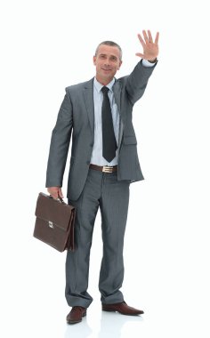 Kendine güvenen işadamı konuksever bir el hareketi yapma