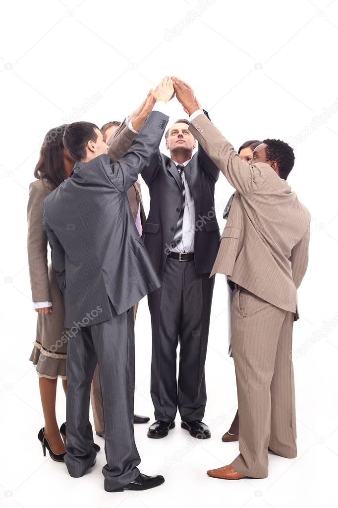 successful business team raising hands together up