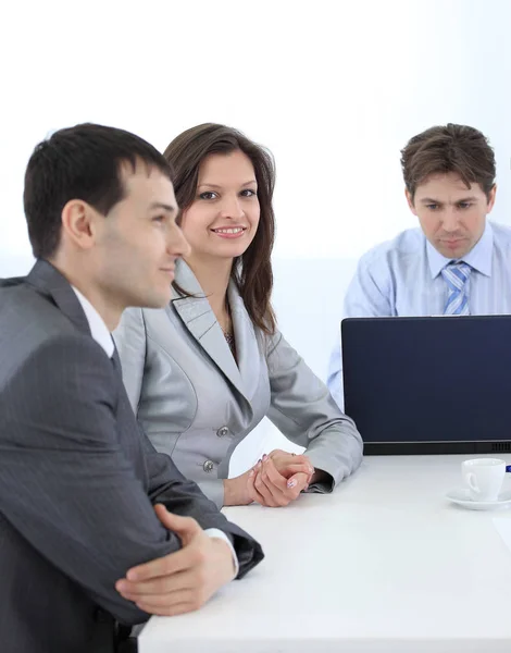 Business woman and colleagues at the workplace — Stock Photo, Image