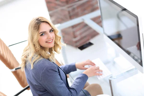 business woman typing on computer keyboard