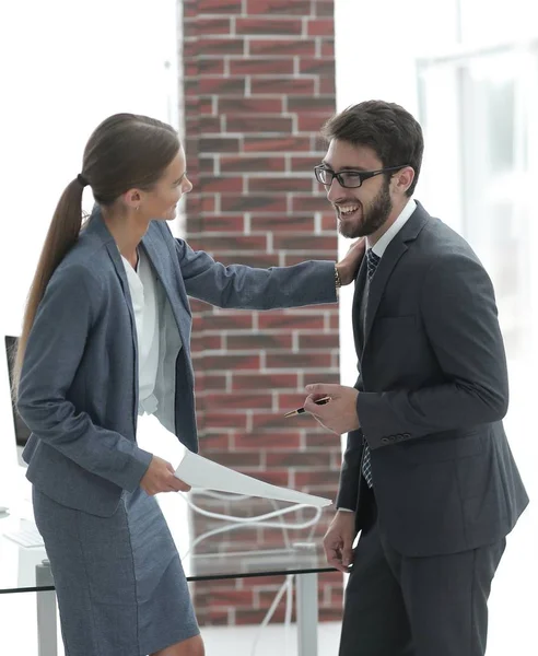 stock image colleagues communicate with each other