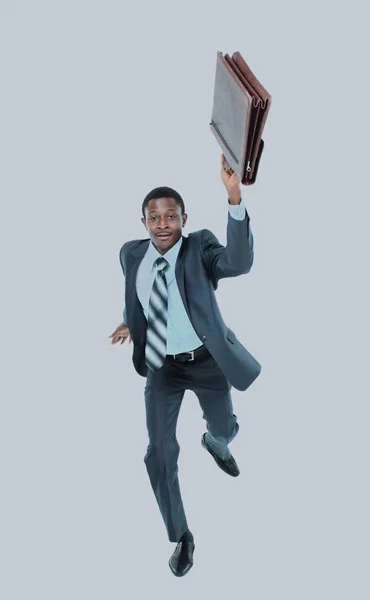 Businessman running with a briefcase, isolated on white background. — Stock Photo, Image