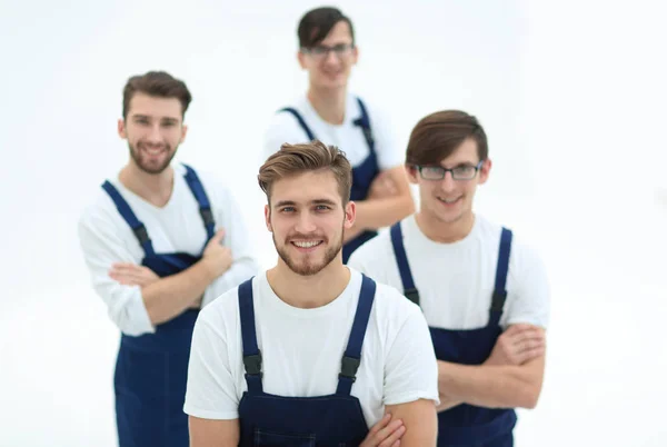 The team of responsible movers and their smiling leader — Stock Photo, Image
