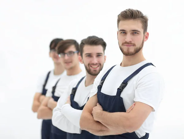 Équipe joyeuse de déménageurs responsables isolés sur fond blanc — Photo