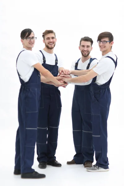 Equipo de motores mostrando la unidad, la gente poniendo sus manos juntas — Foto de Stock