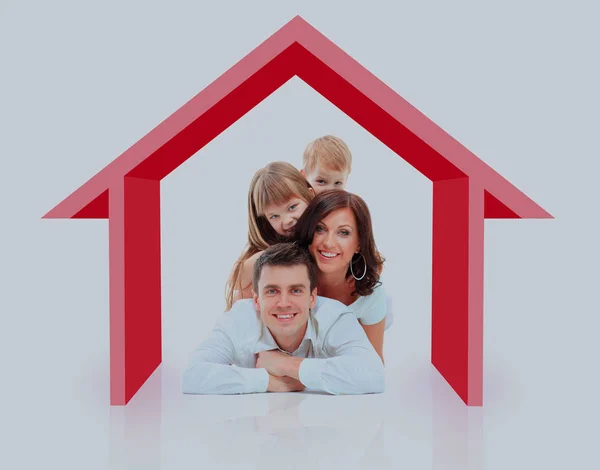 Beautiful family in a house - isolated over a white background. Stock Photo