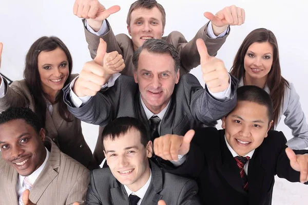 Equipe de negócios multicultural com polegares para cima — Fotografia de Stock