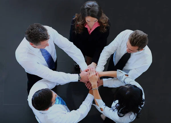 Visão superior dos empresários com as mãos juntas em um círculo . — Fotografia de Stock