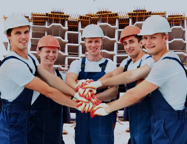 Grupp av professionella byggnadsarbetare. — Stockfoto
