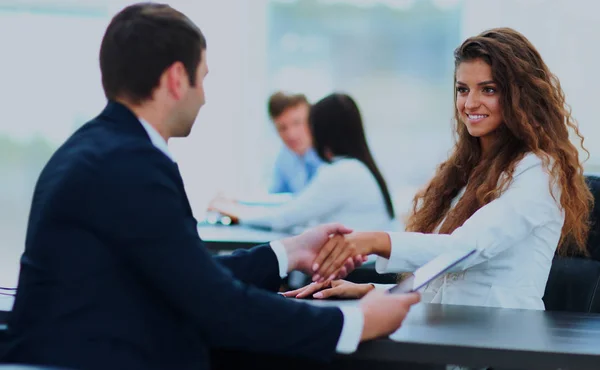 Salesman shaking hands to clients. — Stock Photo, Image