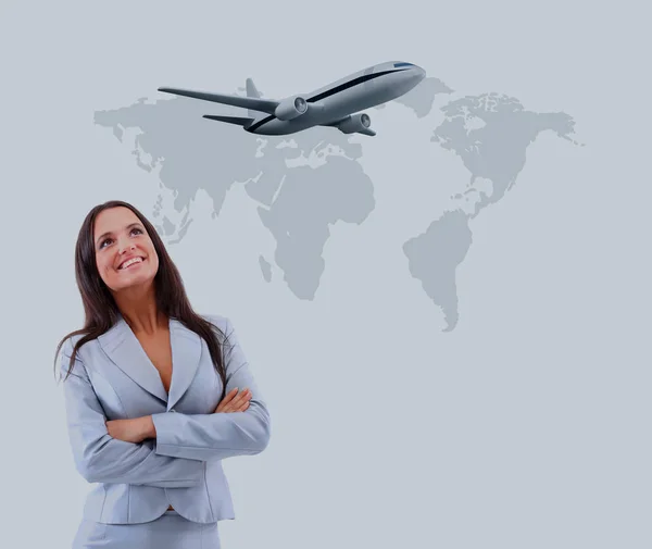 Business woman smileeng and looking at airplane. — Stock Photo, Image