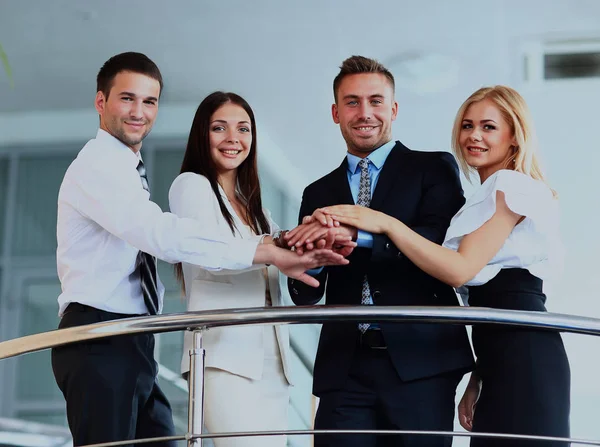 Zakelijke team eenheid met hun handen samen weergegeven:. — Stockfoto