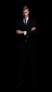 tam büyüme portre. silah ile ciddi iş adamı onun önüne geçti.