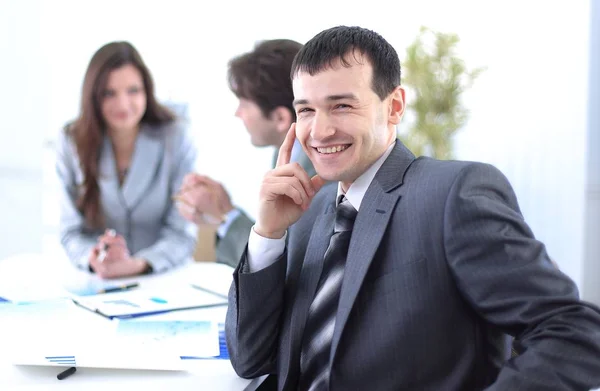 Successful businessman in the workplace — Stock Photo, Image
