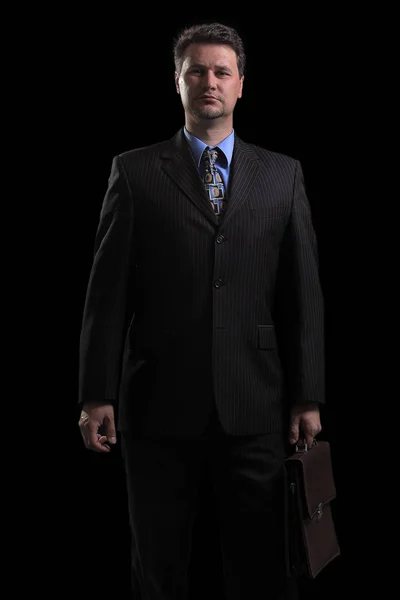 In full growth.confident businessman with briefcase — Stock Photo, Image