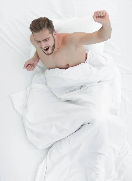 Top view.a very happy man Sunday morning — Stock Photo, Image