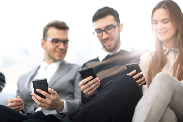 Closeup. employees talking in the workplace — Stock Photo, Image