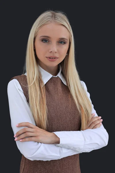 Retrato de una joven empresaria confiada. aislado sobre un fondo oscuro . — Foto de Stock