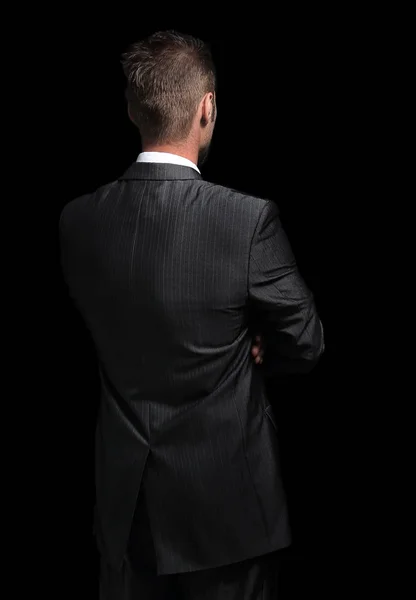 Rear view .confident businessman looking at copy space. — Stock Photo, Image