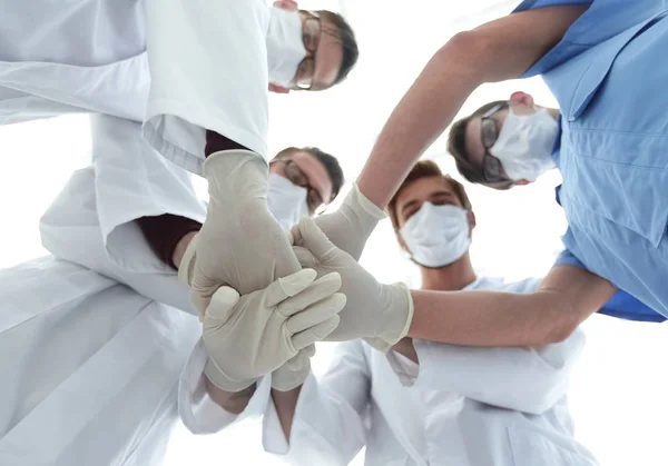 Bottom view.the surgical team showing their unity. — Stock Photo, Image