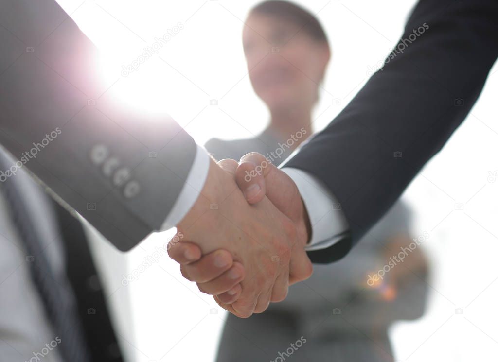 background image of handshake of business people .