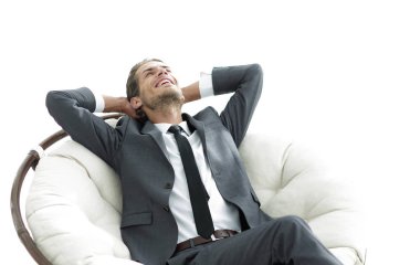 genç işadamı büyük rahat koltukta, meditasyon