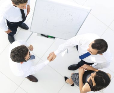 En baştan görüntüleyin. arka plan resmi el sıkışmasının iş ortakları