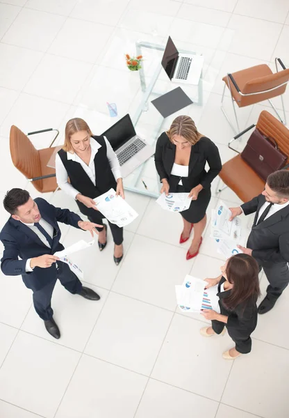 View from the top.business team working with documents standing in the office. — Stock Photo, Image