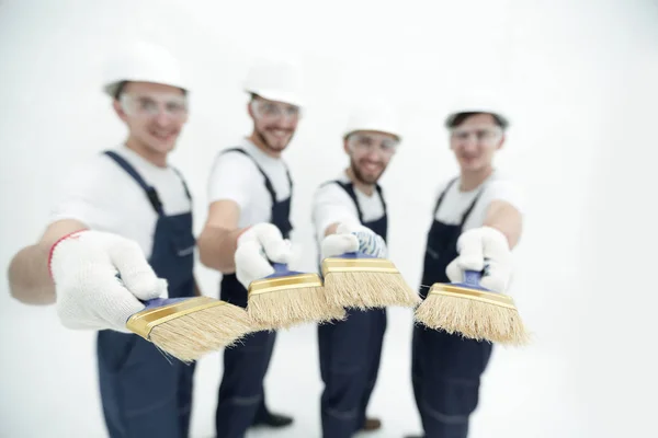 Grupo de trabalhadores da construção .isolated no branco — Fotografia de Stock