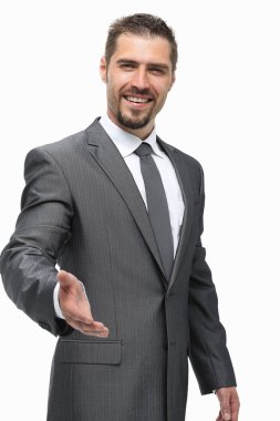 gülümseyen iş adamı için bir el sıkışma elini tutar