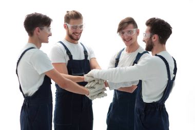 Yakın plan. Bir grup işçi daireler çiziyor..