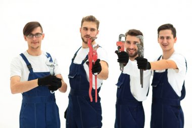Grup inşaat işçileri ile çalışma araçları