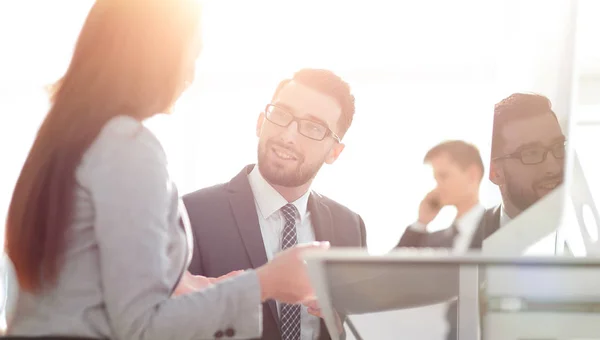 Confident man talking to his interviewer during a job interview