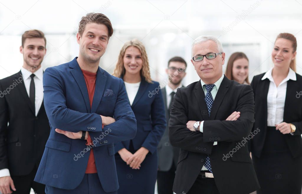 business partners standing in front of the business team.