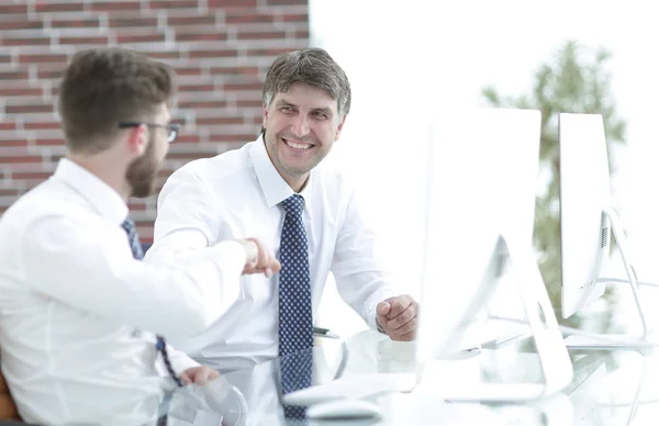Smiling manager at his desk in the office — Stock Photo, Image