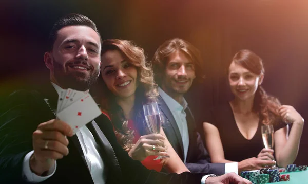 Celebrating victory in poker with champagne. — Stock Photo, Image