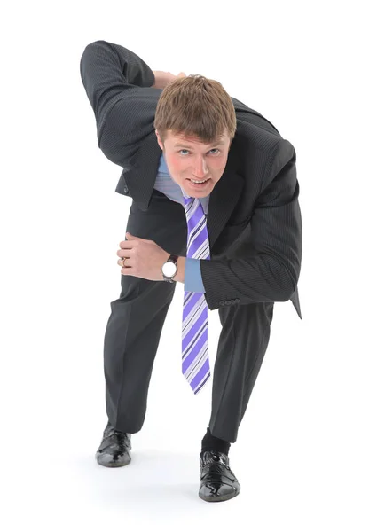 Um jovem homem de negócios bonito, vestido com um terno, começou a correr — Fotografia de Stock