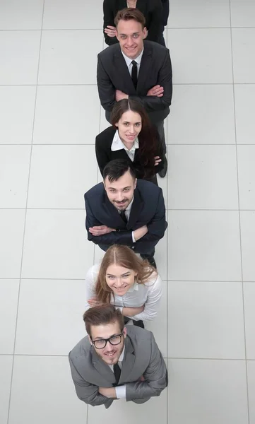 Equipe de negócios em pé em uma coluna sobre um fundo branco — Fotografia de Stock