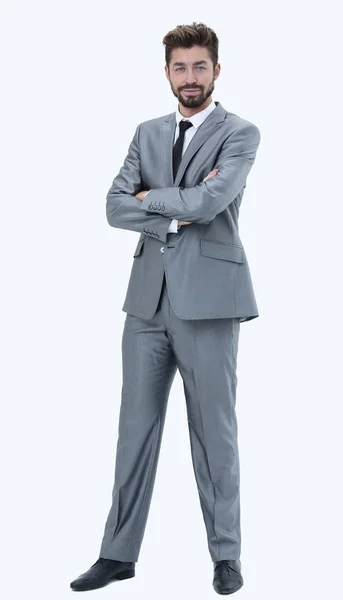 Full length of a young caucasian businessman with arms folded — Stock Photo, Image