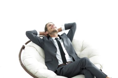 genç işadamı büyük rahat koltukta, meditasyon