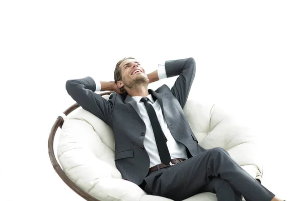 Joven hombre de negocios meditando en gran sillón cómodo —  Fotos de Stock