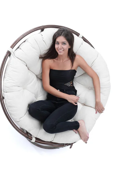 Woman resting in big round soft armchair — Stock Photo, Image