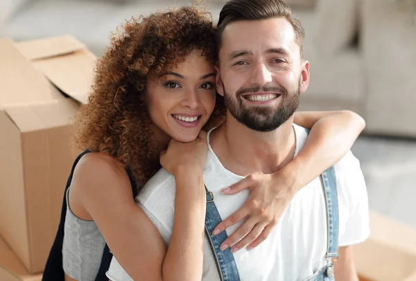 Close-up portrait of a newly-married couple in work clothes