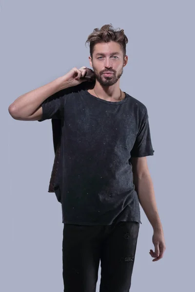 Portrait of a trendy bearded man on a gray background — Stock Photo, Image